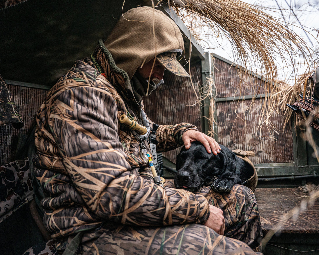 From Farm to Field Blog from Dakota Dog Company. Hunter in the blind with his dog